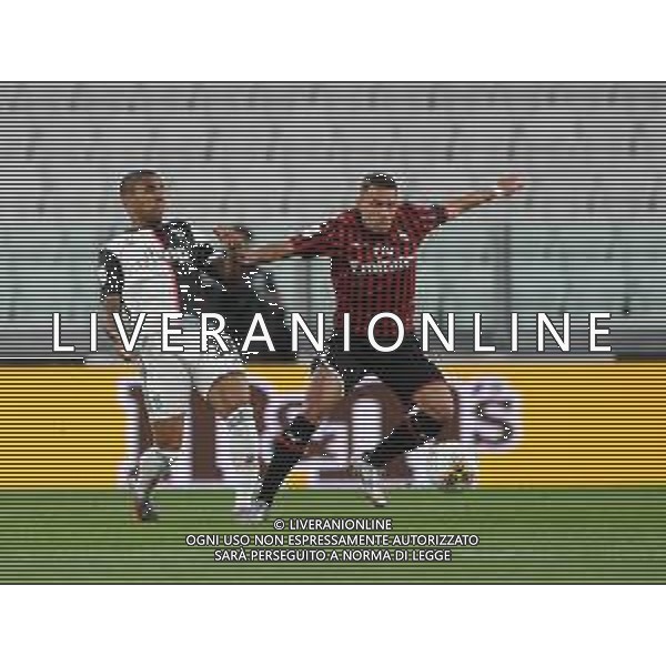 Juventus - Milan Semifinale ritorno Coppa Italia Tim Cup Juventus Stadium Torino 12.06.2020 -partita giocata a porte chiuse emergenza coronavirus Nella foto Douglas costa e Bennacer Ismael ©Agenzia Aldo Liverani Sas
