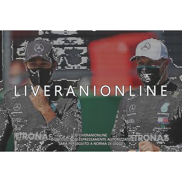 (L to R): Lewis Hamilton (GBR) Mercedes AMG F1 with his team mate in qualifying parc ferme. 04.07.2020. Formula 1 World Championship, Rd 1, Austrian Grand Prix, Spielberg, Austria, Qualifying Day. - www.xpbimages.com, EMail: requests@xpbimages.com © Copyright: Charniaux / XPB Images / AGENZIA ALDO LIVERANI SAS - ITALY ONLY EDITORIAL USE ONLY