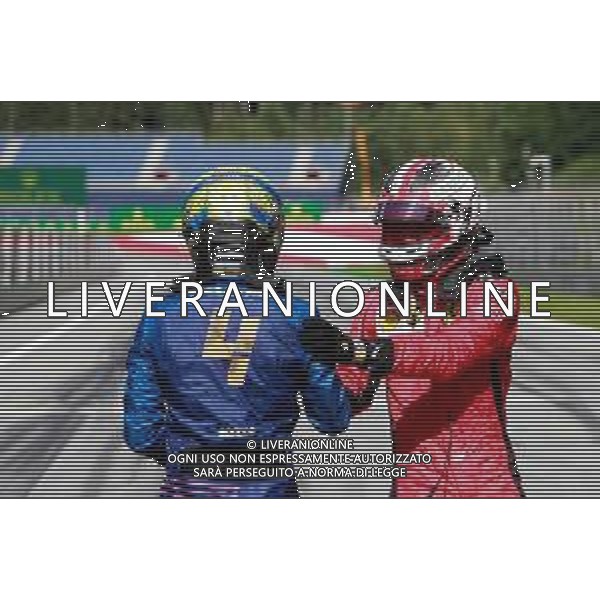 (L to R): third placed Lando Norris (GBR) McLaren celebrates with second placed Charles Leclerc (MON) Ferrari. 05.07.2020. Formula 1 World Championship, Rd 1, Austrian Grand Prix, Spielberg, Austria, Race Day. - www.xpbimages.com, EMail: requests@xpbimages.com - copy of publication required for printed pictures. Every used picture is fee-liable. © Copyright: FIA Pool Image for Editorial Use Only/ AGENZIA ALDO LIVERANI SAS - ITALY ONLY EDITORIAL USE ONLY