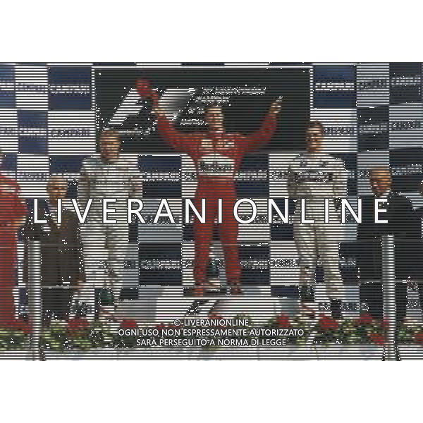 RETROSPETTIVA MICHAEL SCHUMACHER PILOTA F1 NELLA FOTO MICHAEL SCHUMACHER NELL\'ANNO 2000 AL 71 GP DI F1 MONZA SUL PODIO CON RALF SCHUMACHER E MIKKA HAKKINEN AG ALDO LIVERANI SAS