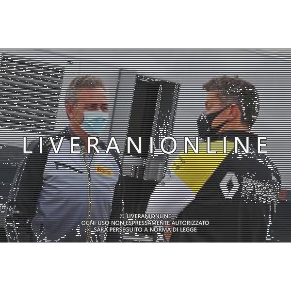 (L to R): Mario Isola (ITA) Pirelli Racing Manager with Marcin Budkowski (POL) Renault F1 Team Executive Director. 18.07.2020. Formula 1 World Championship, Rd 3, Hungarian Grand Prix, Budapest, Hungary, Qualifying Day. / AGENZIA ALDO LIVERANI SAS - ITALY ONLY EDITORIAL USE ONLY