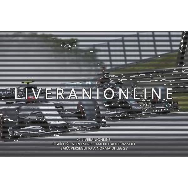 Lewis Hamilton (GBR) Mercedes AMG F1 W11 and Pierre Gasly (FRA) AlphaTauri AT01. 18.07.2020. Formula 1 World Championship, Rd 3, Hungarian Grand Prix, Budapest, Hungary, Qualifying Day. / AGENZIA ALDO LIVERANI SAS - ITALY ONLY EDITORIAL USE ONLY