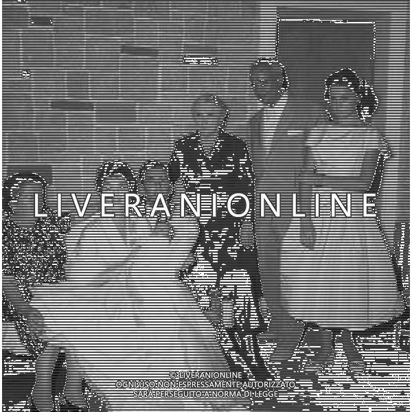 RETROSPETTIVA GINA LOLLOBRIGIDA ATTRICE NELLA FOTO GINA LOLLOBRIGIDA IL GIORNO DEL BATTESIMO DEL FIGLIO ANDREA MILKO SKOFIC NELL\'ANNO 1957 AG ALDO LIVERANI SAS