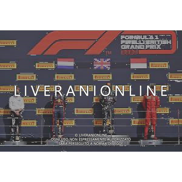 The podium (L to R): Gilles Pironi (FRA) Mercedes AMG F1; Max Verstappen (NLD) Red Bull Racing, second; Lewis Hamilton (GBR) Mercedes AMG F1, race winner; Charles Leclerc (MON) Ferrari, third. 02.08.2020. Formula 1 World Championship, Rd 4, British Grand Prix, Silverstone, England, Race Day. / AGENZIA ALDO LIVERANI SAS - ITALY ONLY EDITORIAL USE ONLY