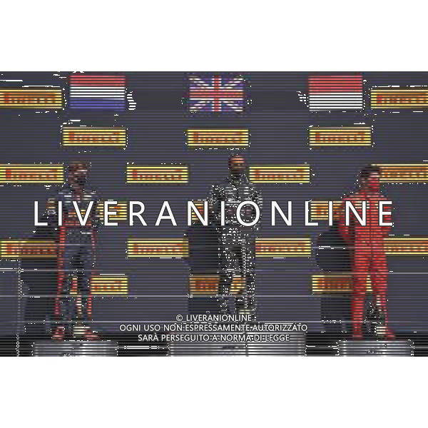 The podium (L to R): Max Verstappen (NLD) Red Bull Racing, second; Lewis Hamilton (GBR) Mercedes AMG F1, race winner; Charles Leclerc (MON) Ferrari, third. 02.08.2020. Formula 1 World Championship, Rd 4, British Grand Prix, Silverstone, England, Race Day. / AGENZIA ALDO LIVERANI SAS - ITALY ONLY EDITORIAL USE ONLY