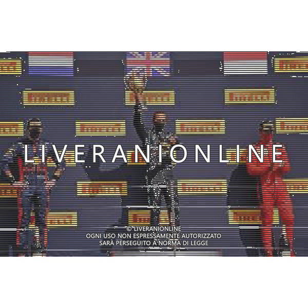 The podium (L to R): Max Verstappen (NLD) Red Bull Racing, second; Lewis Hamilton (GBR) Mercedes AMG F1, race winner; Charles Leclerc (MON) Ferrari, third. 02.08.2020. Formula 1 World Championship, Rd 4, British Grand Prix, Silverstone, England, Race Day. / AGENZIA ALDO LIVERANI SAS - ITALY ONLY EDITORIAL USE ONLY