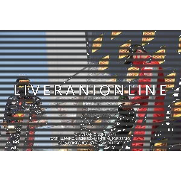 Max Verstappen (NLD) Red Bull Racing RB16 with Lewis Hamilton (GBR) Mercedes AMG F1 W11 and Charles Leclerc (MON) Ferrari SF1000. 02.08.2020. Formula 1 World Championship, Rd 4, British Grand Prix, Silverstone, England, Race Day. / AGENZIA ALDO LIVERANI SAS - ITALY ONLY EDITORIAL USE ONLY