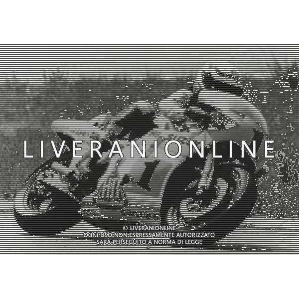 RETROSPETTIVA FRANCO UNCINI MOTOCICLISMO NELLA FOTO FRANCO UNCINI NELL\'ANNO 1983 FOTO W.PIGRUCCI-AG ALDO LIVERANI SAS