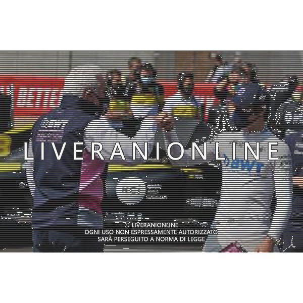 (L to R): Lawrence Stroll (CDN) Racing Point F1 Team Investor on the grid with his son Lance Stroll (CDN) Racing Point F1 Team. 09.08.2020. Formula 1 World Championship, Rd 5, 70th Anniversary Grand Prix, Silverstone, England, Race Day. - www.xpbimages.com, EMail: requests@xpbimages.com © Copyright: Moy / XPB Images /AGENZIA ALDO LIVERANI SAS - ITALY ONLY EDITORIAL USE ONLY