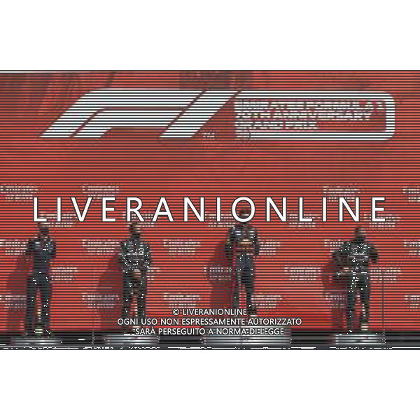 The podium (L to R): Will Courtenay, Red Bull Racing Head of Race Strategy; Lewis Hamilton (GBR) Mercedes AMG F1, second; Max Verstappen (NLD) Red Bull Racing, race winner; Valtteri Bottas (FIN) Mercedes AMG F1, third. 09.08.2020. Formula 1 World Championship, Rd 5, 70th Anniversary Grand Prix, Silverstone, England, Race Day. - www.xpbimages.com, EMail: requests@xpbimages.com © Copyright: Batchelor / XPB Images/AGENZIA ALDO LIVERANI SAS - ITALY ONLY EDITORIAL USE ONLY