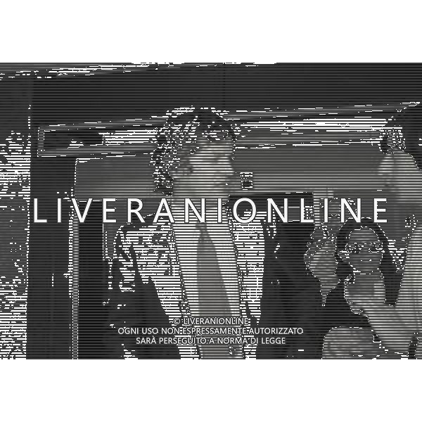 1983 MILANO AEROPORTO DI LINATE RIENTRO DAL BRASILE DEL DIRETTORE SPORTIVO DELL\'UDINESE CALCIO FRANCO DAL CIN CON IL CONTRATTO FIRMATO DEL GIOCATORE BRASILIANO ZICO AG ALDO LIVERANI SAS