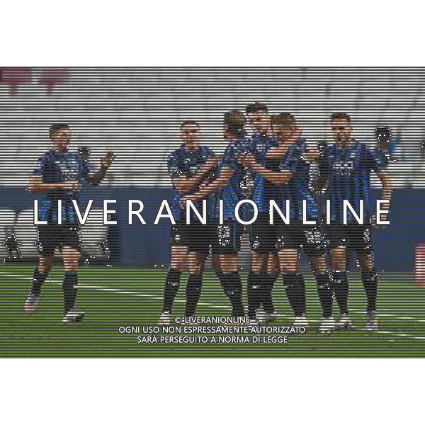 LISBON, PORTUGAL - AUGUST 12: Mario Pasalic of Atalanta celebrates with his team mates after scoring his team\'s first goal during the UEFA Champions League Quarter Final match between Atalanta and Paris Saint-Germain at Estadio do Sport Lisboa e Benfica on August 12, 2020 in Lisbon, Portugal. (Photo by Michael Regan - UEFA/UEFA via Getty Images) AG ALDO LIVERANI SAS