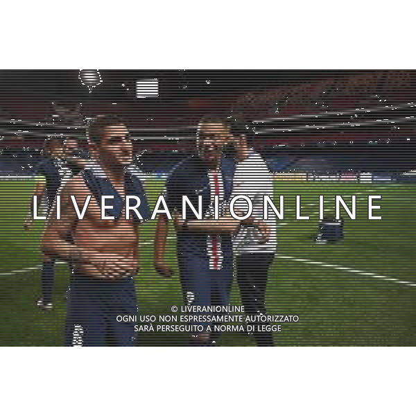 LISBON, PORTUGAL - AUGUST 18: Kylian Mbappe and Marco Verratti of Paris Saint-Germain celebrate victory after the UEFA Champions League Semi Final match between RB Leipzig and Paris Saint-Germain F.C at Estadio do Sport Lisboa e Benfica on August 18, 2020 in Lisbon, Portugal. (Photo by Michael Regan - UEFA/UEFA via Getty Images) AG ALDO LIVERANI SAS