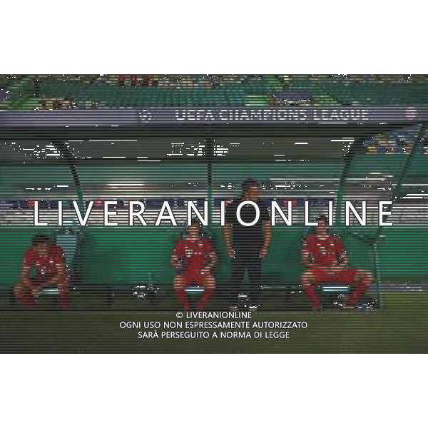 LISBON, PORTUGAL - AUGUST 19: Thomas Muller of Bayern Munich sits with team mates on the bench after the match during the UEFA Champions League Semi Final match between Olympique Lyonnais and Bayern Munich at Estadio Jose Alvalade on August 19, 2020 in Lisbon, Portugal. (Photo by Julian Finney - UEFA/UEFA via Getty Images) AG ALDO LIVERANI SAS
