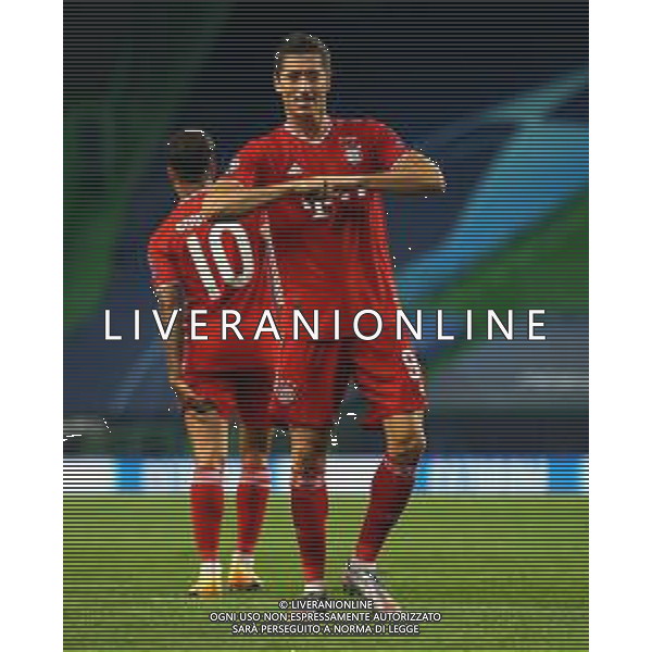 LISBON, PORTUGAL - AUGUST 19: Robert Lewandowski of Bayern Munich celebrates after scoring his team\'s third goal during the UEFA Champions League Semi Final match between Olympique Lyonnais and Bayern Munich at Estadio Jose Alvalade on August 19, 2020 in Lisbon, Portugal. (Photo by Julian Finney - UEFA/UEFA via Getty Images) AG ALDO LIVERANI SAS