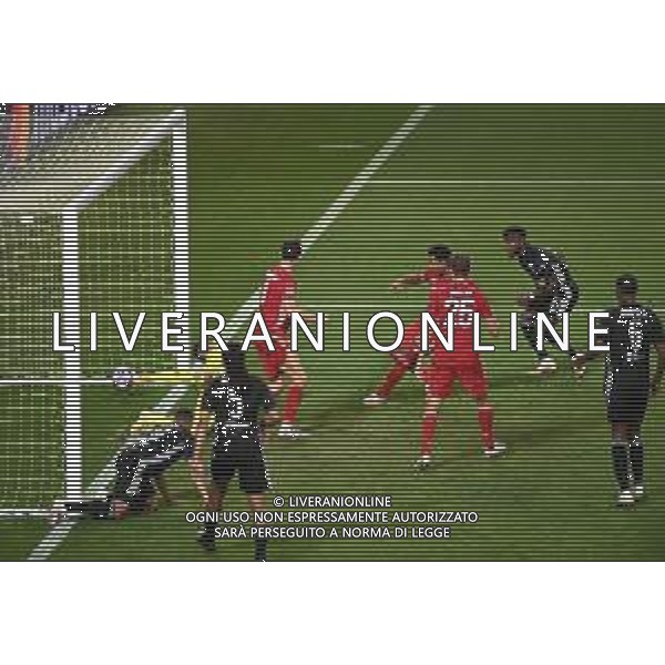 LISBON, PORTUGAL - AUGUST 19: Serge Gnabry of Bayern Munich scores his team\'s second goal past Anthony Lopes of Olympique Lyonnais during the UEFA Champions League Semi Final match between Olympique Lyonnais and Bayern Munich at Estadio Jose Alvalade on August 19, 2020 in Lisbon, Portugal. (Photo by Michael Regan - UEFA/UEFA via Getty Images) AG ALDO LIVERANI SAS