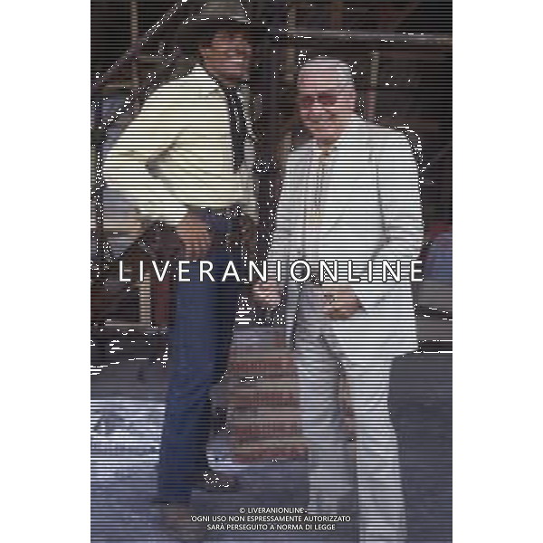 GIOVANNI LUIGI BONELLI, detto GIANLUIGI, Fumettista ed editore italiano, creatore del personaggio di TEX - RETROSPETTIVA. Nella foto con Giuliano Gemma nel 1985 ©ARCHIVIO AGENZIA ALDO LIVERANI SAS