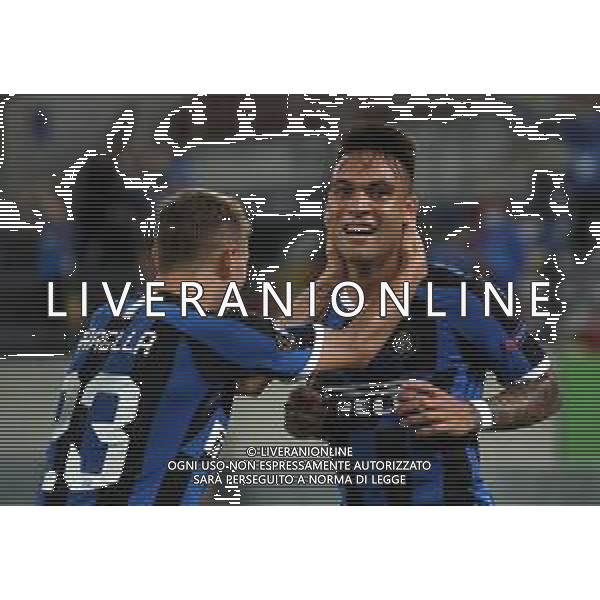 DUESSELDORF, GERMANY - AUGUST 17: Lautaro Martinez of Inter Milan celebrates with Nicolo Barella of Inter Milan after scoring his team\'s third goalduring the UEFA Europa League Semi Final between Internazionale and Shakhtar Donetsk at Merkur Spiel-Arena on August 17, 2020 in Duesseldorf, Germany. (Photo by Alexander Hassenstein - UEFA/UEFA via Getty Images) AG ALDO LIVERANI SAS