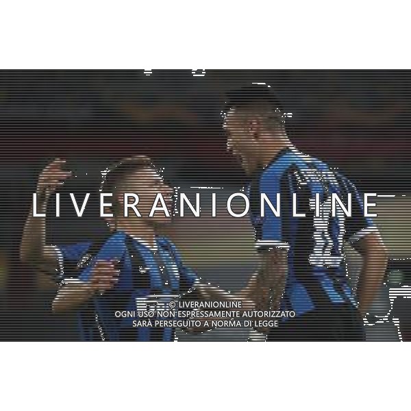 DUESSELDORF, GERMANY - AUGUST 17: Lautaro Martinez of Inter Milan celebrates with Nicolo Barella of Inter Milan after scoring his team\'s third goalduring the UEFA Europa League Semi Final between Internazionale and Shakhtar Donetsk at Merkur Spiel-Arena on August 17, 2020 in Duesseldorf, Germany. (Photo by Alexander Hassenstein - UEFA/UEFA via Getty Images) AG ALDO LIVERANI SAS