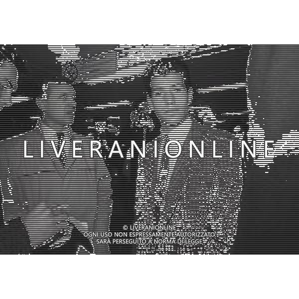 1986 MILANO AEROPORTO DI LINATE ARRIVO DEL NUOVO GIOCATORE DELL\'INTER VINCENZO SCIFO NELLA FOTO VINCENZO SCIFO CON GIANCARLO BELTRAMI AG ALDO LIVERANI SAS