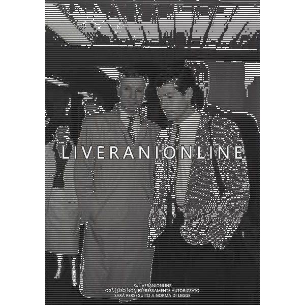 1986 MILANO AEROPORTO DI LINATE ARRIVO DEL NUOVO GIOCATORE DELL\'INTER VINCENZO SCIFO NELLA FOTO VINCENZO SCIFO CON GIANCARLO BELTRAMI AG ALDO LIVERANI SAS