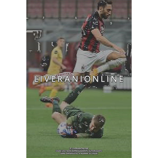 Hakan Calhanoglu (Milan) salta Nikita Haikin (Bodo Glimt) Milan vs Bodo Glimt UEFA Europa League - 3° turno preliminare Milano 24-09-2020 Stadio Giuseppe Meazza - San Siro foto Roberto Garavaglia - agenzia Aldo Liverani sas