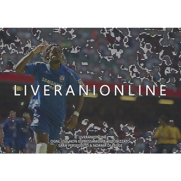 Didier Drogba in the celebration of his second goal-CHELSEA V ARSENAL for the 2005 Communitu Shield at the Millennium Stadium in Cardiff : Date 07/08/05 Picture by Marcello Pozzetti : ©IPS Photo Agency - Adddress:21 Delisle road - London SE28 0JD-