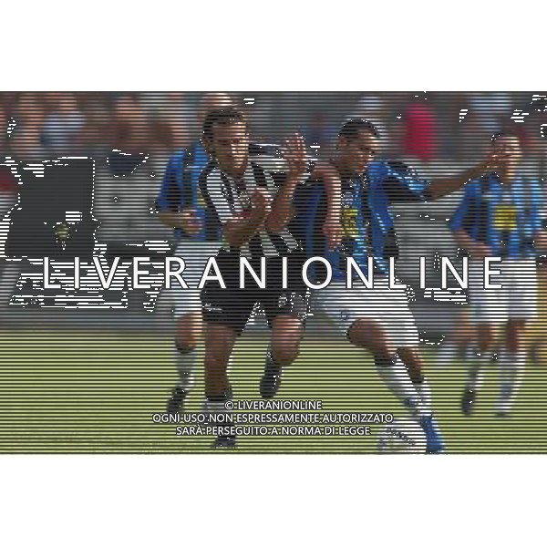 Massa 07/08/2005 Massese-Atalanta Tim Cup 2005/2006 Nella foto: Biggi contro Adriano Pereira Da Silva.* Ph Gianni Nucci/Aldo Liverani