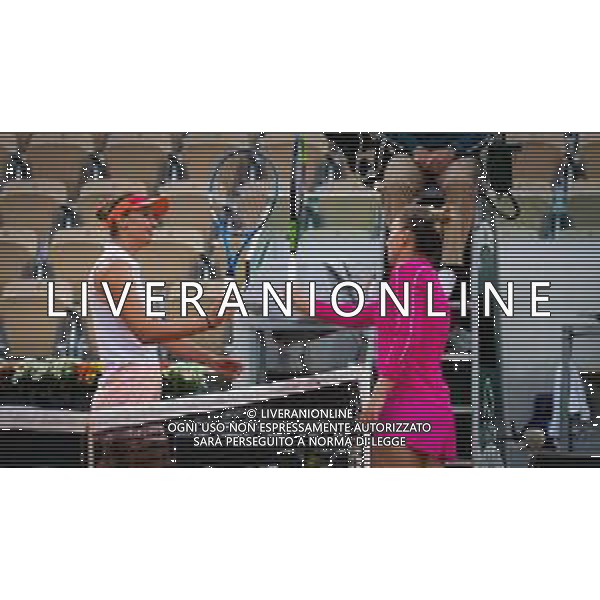 Roland Garros 2020, Grand Slam tournament - Tennis Internationals, 30 September 2020 Roland Garros stadium, paris, france, Italy Photo showing: Simona Halep of Romania and Irina-Camelia Begu of Romania at the net @LM/DPPI/DPPI/Rob Prange AG ALDO LIVERANI SAS
