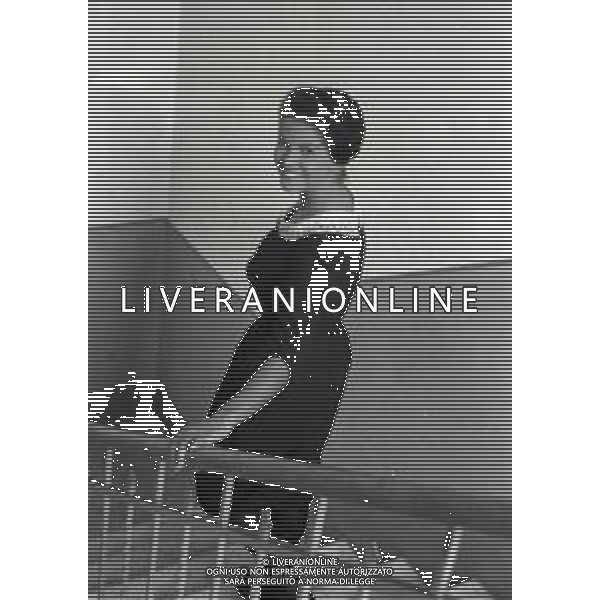 RETROSPETTIVA CLAUDIA CARDINALE ATTRICE NELLA FOTO CLAUDIA CARDINALE SUL SET DI UN FILM"AUDACE COLPO DEI SOLITI IGNOTI NELL\'ANNO 1959 AG ALDO LIVERANI SAS 