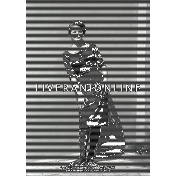 RETROSPETTIVA CLAUDIA CARDINALE ATTRICE NELLA FOTO CLAUDIA CARDINALE SUL SET DI UN FILM"AUDACE COLPO DEI SOLITI IGNOTI NELL\'ANNO 1959 AG ALDO LIVERANI SAS 