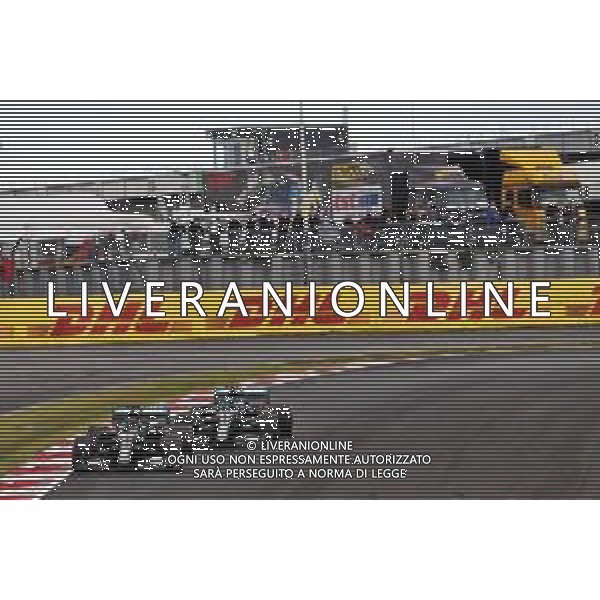 Lewis Hamilton (GBR) Mercedes AMG F1 W11 takes the lead of the race from team mate Valtteri Bottas (FIN) Mercedes AMG F1 W11. 11.10.2020. Formula 1 World Championship, Rd 11, Eifel Grand Prix, Nurbugring, Germany, Race Day. - www.xpbimages.com, EMail: requests@xpbimages.com © Copyright: Batchelor / XPB Images/ AGENZIA ALDO LIVERANI SAS - ITALY ONLY EDITORIAL USE ONLY