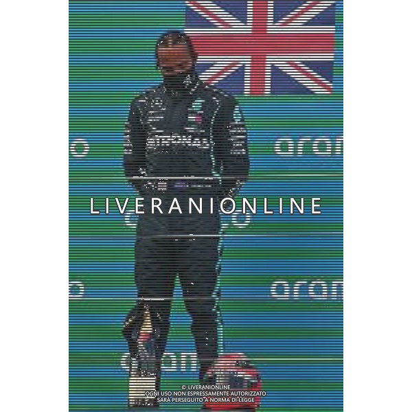 Race winner Lewis Hamilton (GBR) Mercedes AMG F1 celebrates on the podium with the helmet of Michael Schumacher. 11.10.2020. Formula 1 World Championship, Rd 11, Eifel Grand Prix, Nurbugring, Germany, Race Day. - www.xpbimages.com, EMail: requests@xpbimages.com © Copyright: XPB Images/ AGENZIA ALDO LIVERANI SAS - ITALY ONLY EDITORIAL USE ONLY
