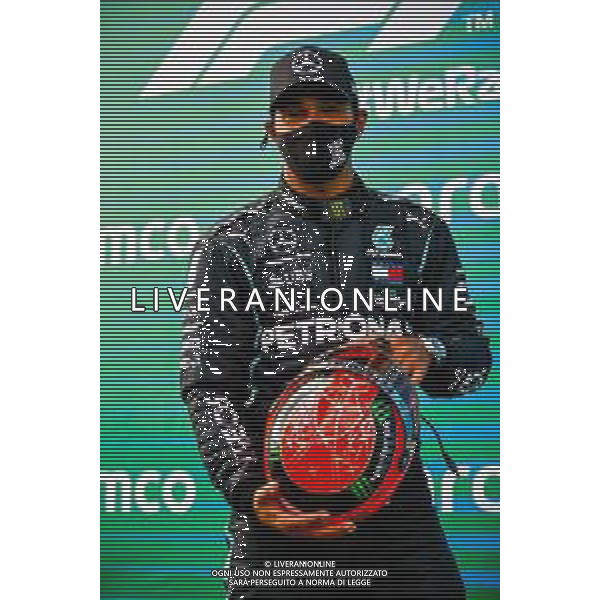 Race winner Lewis Hamilton (GBR) Mercedes AMG F1 with the helmet of Michael Schumacher (GER) by Mick Schumacher (GER) in parc ferme after equalling the record for the number of F1 victories. 11.10.2020. Formula 1 World Championship, Rd 11, Eifel Grand Prix, Nurbugring, Germany, Race Day. - www.xpbimages.com, EMail: requests@xpbimages.com © Copyright: FIA Pool Image for Editorial Use Only/ AGENZIA ALDO LIVERANI SAS - ITALY ONLY EDITORIAL USE ONLY
