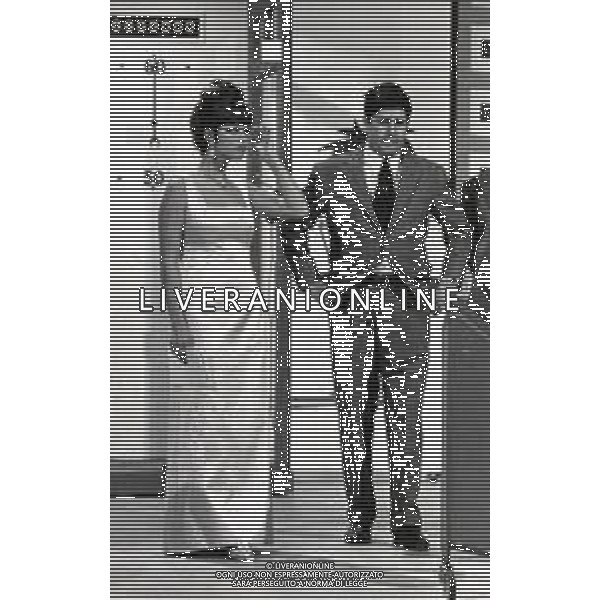 RETROSPETTIVA CLAUDIA CARDINALE ATTRICE NELLA FOTO CLAUDIA CARDINALE A MILANO NELL\'ANNO 1966 CON IL REGISTA ANTONELLO FALQUI E RITA PAVONE AG ALDO LIVERANI SAS 