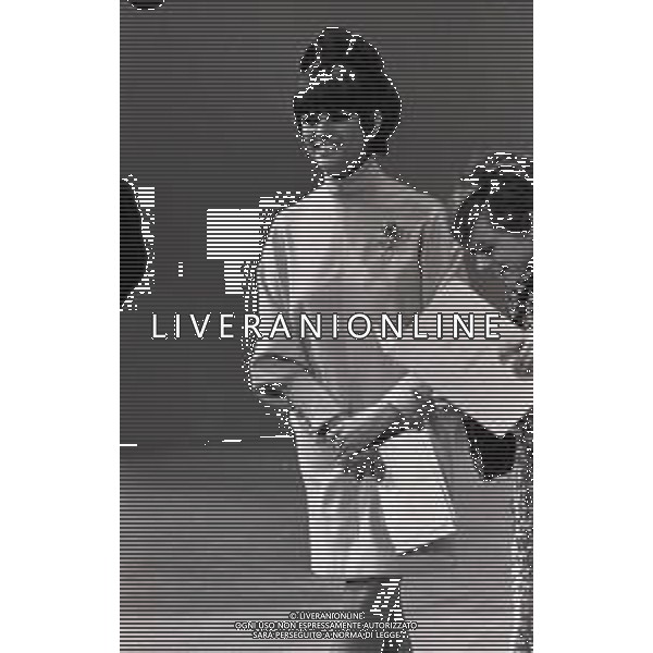 RETROSPETTIVA CLAUDIA CARDINALE ATTRICE NELLA FOTO CLAUDIA CARDINALE A MILANO NELL\'ANNO 1966 CON IL REGISTA ANTONELLO FALQUI E RITA PAVONE AG ALDO LIVERANI SAS 