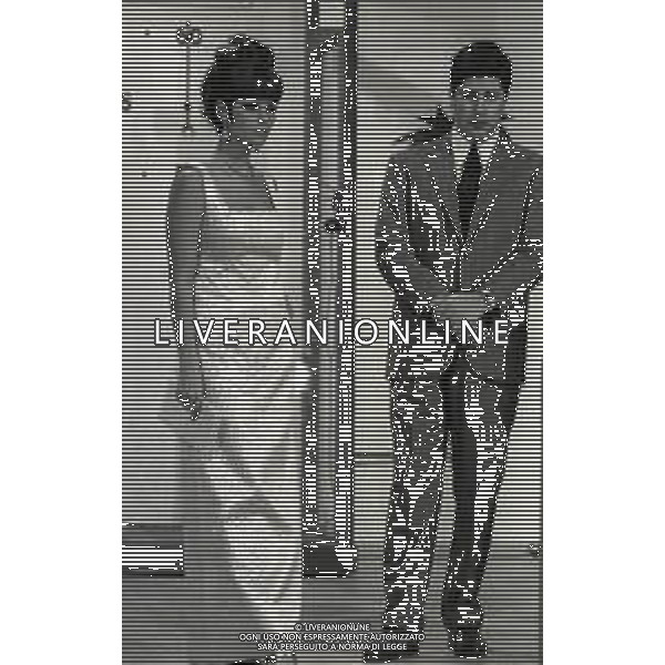 RETROSPETTIVA CLAUDIA CARDINALE ATTRICE NELLA FOTO CLAUDIA CARDINALE A MILANO NELL\'ANNO 1966 CON IL REGISTA ANTONELLO FALQUI E RITA PAVONE AG ALDO LIVERANI SAS 