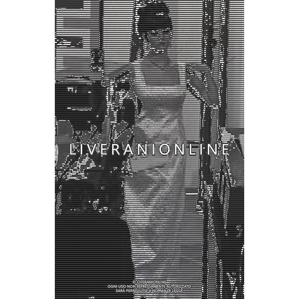 RETROSPETTIVA CLAUDIA CARDINALE ATTRICE NELLA FOTO CLAUDIA CARDINALE A MILANO NELL\'ANNO 1966 CON IL REGISTA ANTONELLO FALQUI E RITA PAVONE AG ALDO LIVERANI SAS 