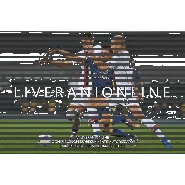 Hellas Verona vs Genoa - italian soccer Serie A match 2020/2021, 19 October 2020 Verona, Italy Photo showing: Nikola kalinic (Verona) between Andrea Masiello and Ivan Radovanovic (Genoa) @LM/Alessio Tarpini/ AGENZIA ALDO LIVERANI SAS