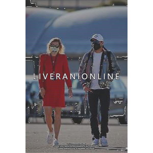 (L to R): Tiffany Cromwell (AUS) Professional Cyclist with boyfriend Valtteri Bottas (FIN) Mercedes AMG F1. 24.10.2020. Formula 1 World Championship, Rd 12, Portuguese Grand Prix, Portimao, Portugal, Qualifying Day. - www.xpbimages.com, EMail: requests@xpbimages.com © Copyright: Batchelor / XPB Images / AGENZIA ALDO LIVERANI SAS - ITALY ONLY EDITORIAL USE ONLY