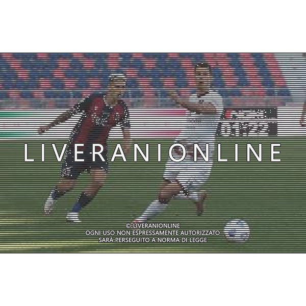 Bologna Calcio vs Reggina 1914 - Italian soccer Coppa Italia match 2020/2021, 27 October 2020 Dall&#39;Ara Stadium, Bologna, Italy Photo showing: Bologna\'s Nicolas Dominguez (L) and Reggina\'s Marco Rossi @LM/Michele Nucci AG ALDO LIVERANI SAS
