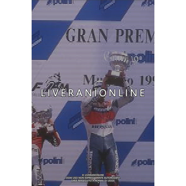 MICHAEL \'MICK\' DOOHAN, PILOTA MOTOCICLISTICA AUSTRALIANO - RETROSPETTIVA NELLA FOTO NEL 1997 AL MUGELLO SUL PODIO ©Controluce Monza/ ARCHIVIO AGENZIA ALDO LIVERANI SAS