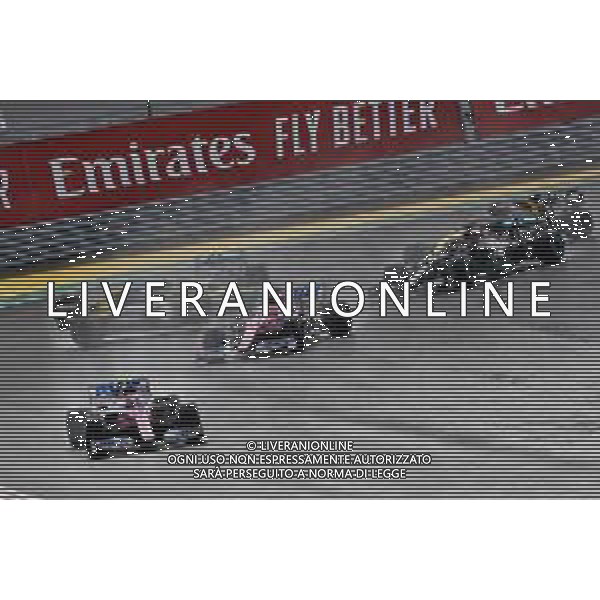 Lance Stroll (CDN) Racing Point F1 Team RP20 leads at the start of the race as Esteban Ocon (FRA) Renault F1 Team RS20 and Valtteri Bottas (FIN) Mercedes AMG F1 W11 spin off the circuit. 15.11.2020. Formula 1 World Championship, Rd 14, Turkish Grand Prix, Istanbul, Turkey, Race Day. - www.xpbimages.com, EMail: requests@xpbimages.com © Copyright: Staley / XPB Images / AGENZIA ALDO LIVERANI SAS - ITALY ONLY EDITORIAL USE ONLY