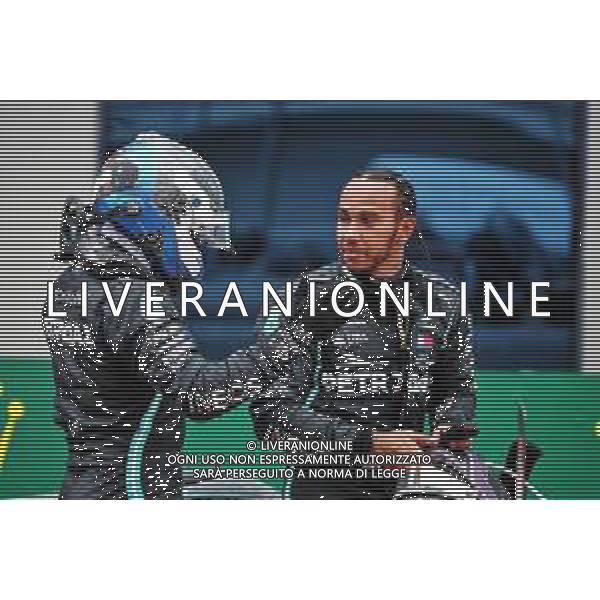 Race winner Lewis Hamilton (GBR) Mercedes AMG F1 celebrates winning his seventh World Championship in parc ferme with team mate Valtteri Bottas (FIN) Mercedes AMG F1. 15.11.2020. Formula 1 World Championship, Rd 14, Turkish Grand Prix, Istanbul, Turkey, Race Day. - www.xpbimages.com, EMail: requests@xpbimages.com © Copyright: Batchelor / XPB Images / AGENZIA ALDO LIVERANI SAS - ITALY ONLY EDITORIAL USE ONLY