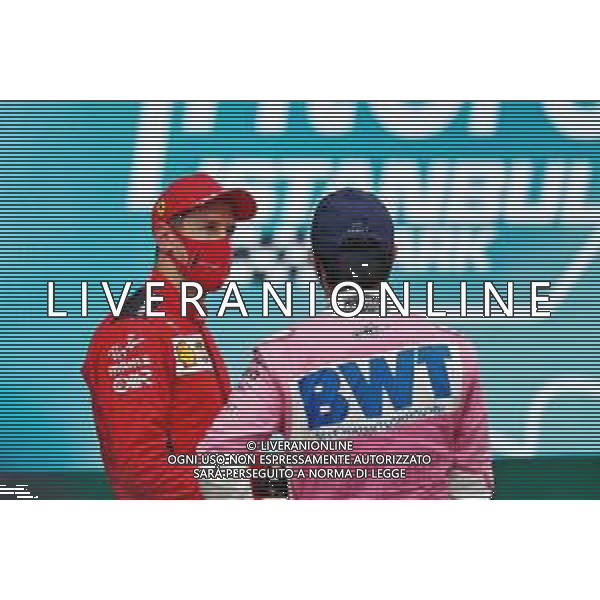 (L to R): third placed Sebastian Vettel (GER) Ferrari with second placed Sergio Perez (MEX) Racing Point F1 Team in parc ferme. 15.11.2020. Formula 1 World Championship, Rd 14, Turkish Grand Prix, Istanbul, Turkey, Race Day. - www.xpbimages.com, EMail: requests@xpbimages.com © Copyright: Staley / XPB Images / AGENZIA ALDO LIVERANI SAS - ITALY ONLY EDITORIAL USE ONLY
