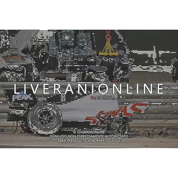 The heavily damaged Haas F1 Team VF-20 of Romain Grosjean (FRA) Haas F1 Team after crashed at the start of the race and exploded into flames, destroying the armco barrier. 29.11.2020. Formula 1 World Championship, Rd 15, Bahrain Grand Prix, Sakhir, Bahrain, Race Day. - www.xpbimages.com, EMail: requests@xpbimages.com © Copyright: Batchelor / XPB Images / AGENZIA ALDO LIVERANI SAS - ITALY ONLY EDITORIAL USE ONLY