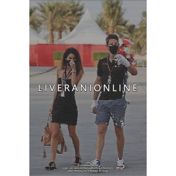 Romain Grosjean (FRA) Haas F1 Team with his wife Marion Grosjean (FRA). 05.12.2020. Formula 1 World Championship, Rd 16, Sakhir Grand Prix, Sakhir, Bahrain, Qualifying Day. - www.xpbimages.com, EMail: requests@xpbimages.com © Copyright: Moy / XPB Images/AGENZIA ALDO LIVERANI SAS - ITALY ONLY EDITORIAL USE ONLY