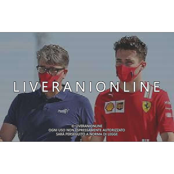 Charles Leclerc (MON) Ferrari with his Manager Morgan Caron. 11.12.2020. Formula 1 World Championship, Rd 17, Abu Dhabi Grand Prix, Yas Marina Circuit, Abu Dhabi, Practice Day. - www.xpbimages.com, EMail: requests@xpbimages.com © Copyright: Batchelor / XPB Images/AGENZIA ALDO LIVERANI SAS - ITALY ONLY EDITORIAL USE ONLY
