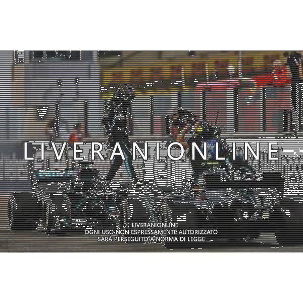 Lewis Hamilton (GBR) Mercedes AMG F1 W11 and Valtteri Bottas (FIN) Mercedes AMG F1 W11 at the end of the race. 13.12.2020. Formula 1 World Championship, Rd 17, Abu Dhabi Grand Prix, Yas Marina Circuit, Abu Dhabi, Race Day. - www.xpbimages.com, EMail: requests@xpbimages.com © Copyright: Moy / XPB Images/AGENZIA ALDO LIVERANI SAS - ITALY ONLY EDITORIAL USE ONLY