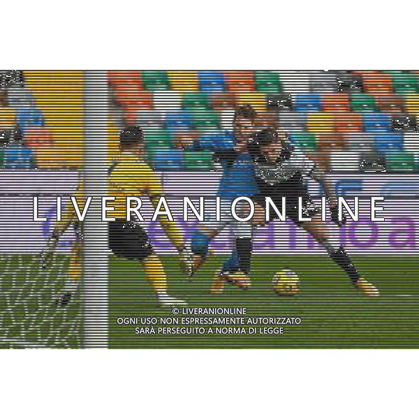 Ettore Griffoni/LM - Udinese Calcio vs SSC Napoli - Italian football Serie A match 2020/2021 10 January 2021 - Friuli Dacia Arena stadium, udine, Italy Photo showing: Piotr Zielinski (Napoli) hindered by Kevin Bonifazi (Udinese) @LM/Ettore Griffoni AG ALDO LIVERANI SAS